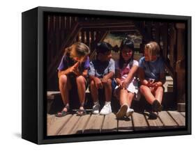 Children Sitting in Playground-Mark Gibson-Framed Stretched Canvas