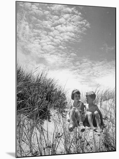 Children Sitting on a Sand Dune-Cornell Capa-Mounted Photographic Print