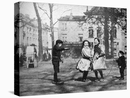 Children Skipping in the Grand Place, Bruges, Belgium, 1922-FC Davis-Stretched Canvas