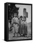 Children Standing in Front of Boundary Zone Sign Written in Russian, English, and Korean-John Florea-Framed Stretched Canvas