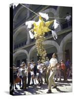 Children Taking Turns Breaking Pinata During Christmas Festival-John Dominis-Stretched Canvas