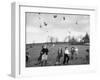 Children Trying to Catch Toys That Were Released by a Kite in the Air-Bernard Hoffman-Framed Photographic Print