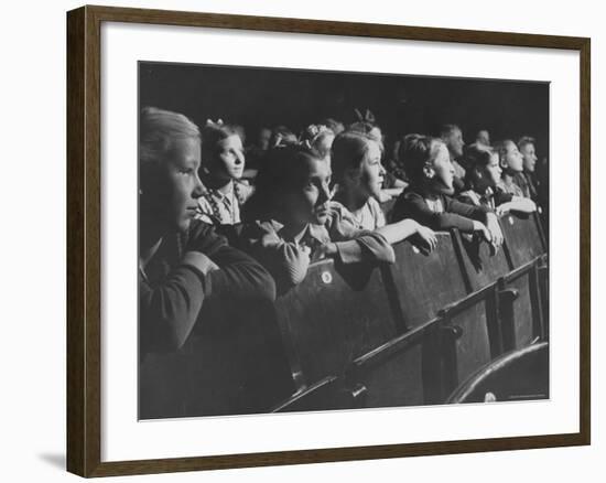 Children Viewing a Theater Production About a Boy Living in the Us-Nat Farbman-Framed Photographic Print