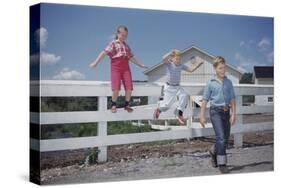 Children Walking Away from Fence-William P. Gottlieb-Stretched Canvas