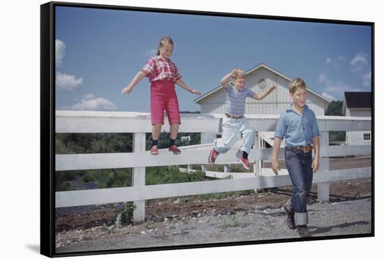 Children Walking Away from Fence-William P. Gottlieb-Framed Stretched Canvas
