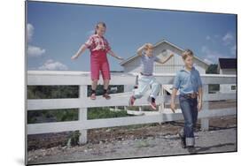 Children Walking Away from Fence-William P. Gottlieb-Mounted Photographic Print