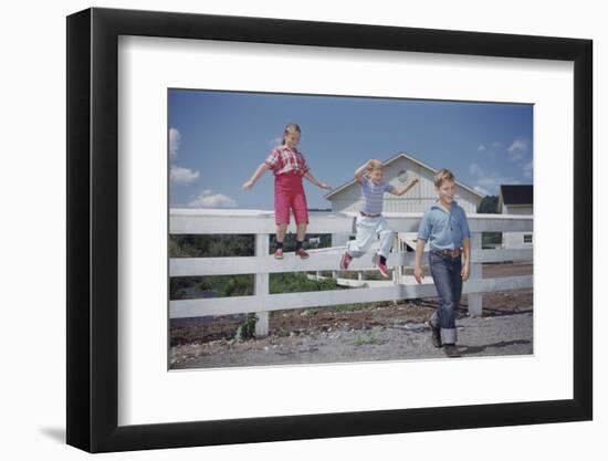 Children Walking Away from Fence-William P. Gottlieb-Framed Photographic Print