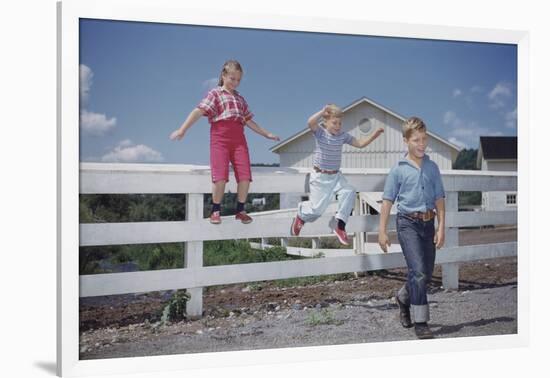 Children Walking Away from Fence-William P. Gottlieb-Framed Photographic Print