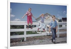 Children Walking Away from Fence-William P. Gottlieb-Framed Photographic Print