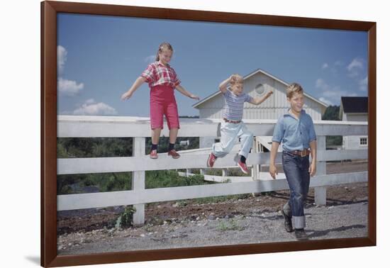 Children Walking Away from Fence-William P. Gottlieb-Framed Photographic Print