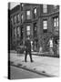 Children Watching a Policeman Walk His Beat in Front of Apartment Buildings-Ed Clark-Stretched Canvas