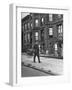 Children Watching a Policeman Walk His Beat in Front of Apartment Buildings-Ed Clark-Framed Photographic Print