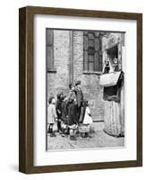 Children Watching a Punch and Judy Show in a London Street, 1936-Donald Mcleish-Framed Giclee Print