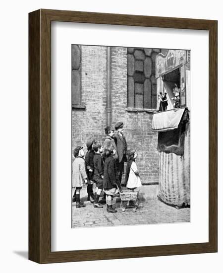 Children Watching a Punch and Judy Show in a London Street, 1936-Donald Mcleish-Framed Giclee Print