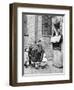 Children Watching a Punch and Judy Show in a London Street, 1936-Donald Mcleish-Framed Giclee Print