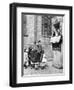 Children Watching a Punch and Judy Show in a London Street, 1936-Donald Mcleish-Framed Giclee Print