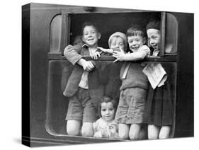 Children Waving While Being Evacuated-Associated Newspapers-Stretched Canvas