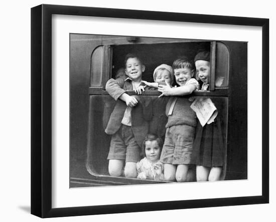 Children Waving While Being Evacuated-Associated Newspapers-Framed Photo
