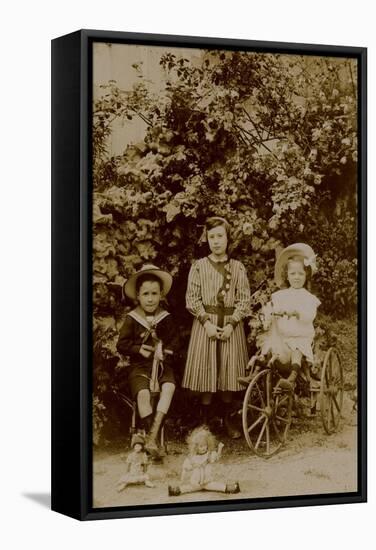 Children with Dolls, Rocking Horse and Tricycle, C.1890-null-Framed Stretched Canvas