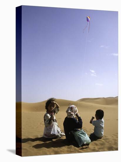 Children with Kite, Morocco-Michael Brown-Stretched Canvas
