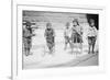 Children With Tricycles Playing In Manhattan Street-null-Framed Art Print