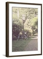Childs Bike Against Lampost-Jillian Melnyk-Framed Photographic Print