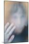 Childs Face Behind Glass-Steve Allsopp-Mounted Photographic Print