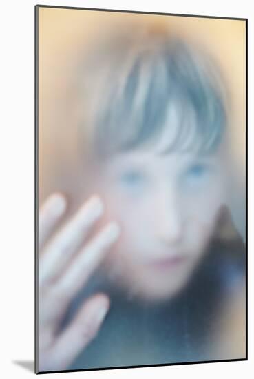 Childs Face Behind Glass-Steve Allsopp-Mounted Photographic Print