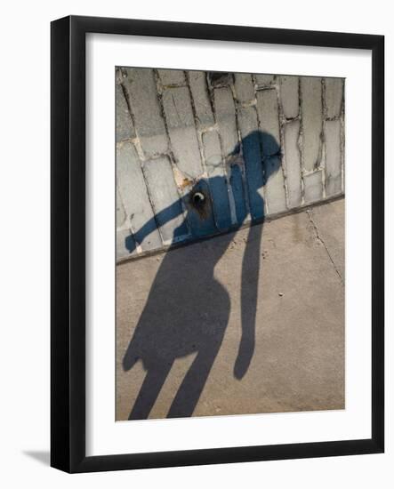 Childs Shadow on Wall-Clive Nolan-Framed Photographic Print