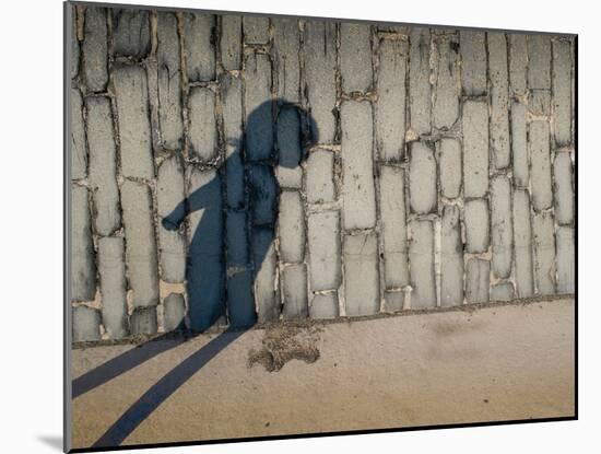 Childs Shadow on Wall-Clive Nolan-Mounted Photographic Print