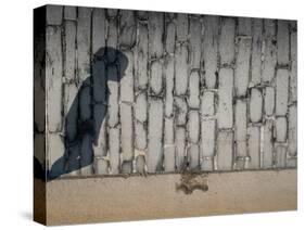 Childs Shadow on Wall-Clive Nolan-Stretched Canvas