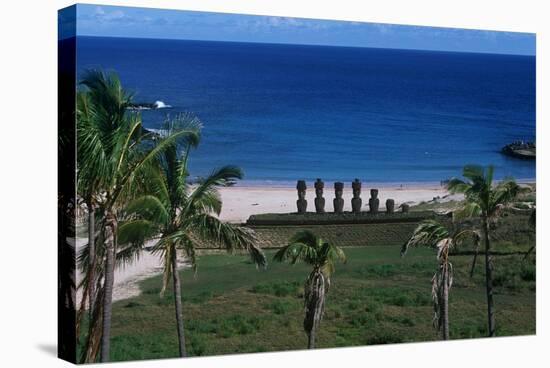 Chile, Easter Island, Rapa-Nui National Park, Anakena Bay, Ahu Nau Nau, Palm Trees and Moai Statues-null-Stretched Canvas