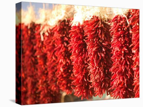 Chili Pepper Ristras, Santa Fe, New Mexico-Walter Bibikow-Stretched Canvas