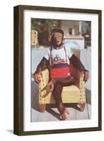 Chimp Sitting in Armchair-null-Framed Art Print