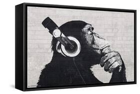 Chimp with Headphones on Wall-Trends International-Framed Stretched Canvas