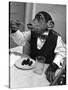 Chimpanzee Dining at a Table-null-Stretched Canvas