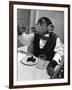 Chimpanzee Dining at a Table-null-Framed Premium Photographic Print