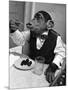 Chimpanzee Dining at a Table-null-Mounted Photographic Print