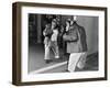 Chimpanzee in a Jacket and Trousers in Front of a Mirror-null-Framed Photo