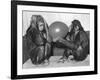 Chimpanzee Inflates a Balloon-null-Framed Photographic Print