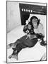 Chimpanzee Sitting in Bed on the Telephone and Smoking a Cigar-null-Mounted Photo