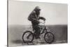 Chimpanzee Titine Riding a Bicycle at the Zoo in Berlin-null-Stretched Canvas