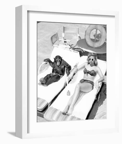 Chimpanzee & Woman Sunbathing-null-Framed Art Print