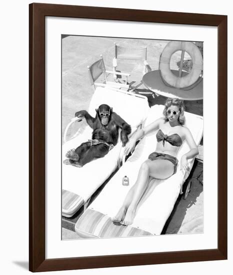 Chimpanzee & Woman Sunbathing-null-Framed Art Print