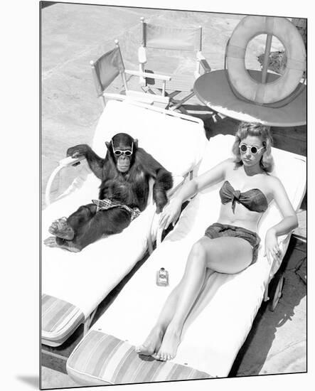 Chimpanzee & Woman Sunbathing-null-Mounted Art Print