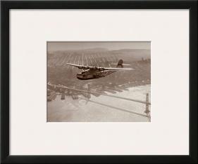 China Clipper in Flight over San Francisco, California 1939-Clyde Sunderland-Framed Art Print