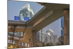 China, Jiangsu, Nanjing. Expressway and modern buildings near Nanjing South Station.-Rob Tilley-Mounted Photographic Print