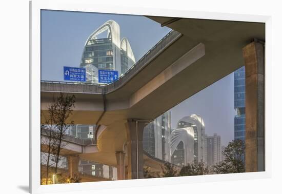 China, Jiangsu, Nanjing. Expressway and modern buildings near Nanjing South Station.-Rob Tilley-Framed Photographic Print