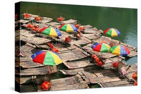 China, Li River, Rafts with Colourful Sunshades-Catharina Lux-Stretched Canvas