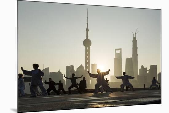 China, Shanghai, Martial Arts Group Practicing Tai Chi at Dawn-Paul Souders-Mounted Photographic Print